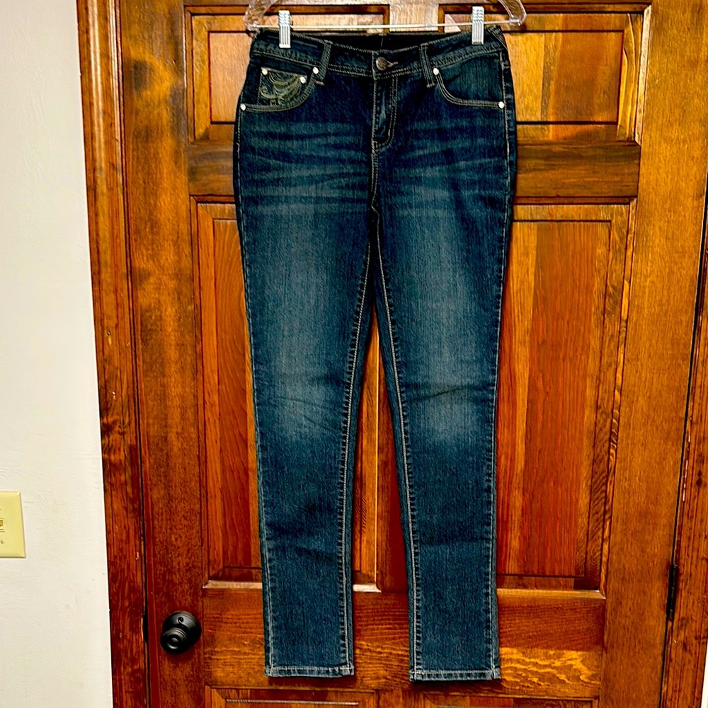 Earl straight legged blue jeanss with rhinestone back flap pockets